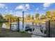 Waterfront dock equipped with a cleaning station, ideal for fishing or boating enthusiasts at 14924 Old Dixie Hwy, Hudson, FL 34667