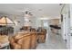 Open floor plan showcasing the living room, kitchen bar, and dining area at 14924 Old Dixie Hwy, Hudson, FL 34667