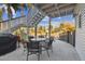 Outdoor patio with seating under stairway, perfect for entertaining and enjoying waterfront views at 14924 Old Dixie Hwy, Hudson, FL 34667