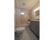 This bathroom features a tub with white subway tile, a marble countertop, and hexagon tile flooring at 1510 49Th N St, St Petersburg, FL 33710