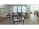 Bright living room with elegant decor, modern furnishings and beautiful wood-look floors at 1510 49Th N St, St Petersburg, FL 33710