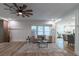 Open-concept living room featuring modern finishes, plenty of natural light and luxury vinyl flooring at 1510 49Th N St, St Petersburg, FL 33710