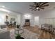 Stylishly furnished living room offering natural light and an open layout that flows into the dining area at 1510 49Th N St, St Petersburg, FL 33710