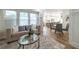 Bright and open living room, seamlessly connected to dining area and kitchen, perfect for entertaining at 1510 49Th N St, St Petersburg, FL 33710