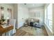 Office with bright light, modern furniture and decor, and french doors at 1510 49Th N St, St Petersburg, FL 33710