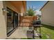 Charming back patio with an outdoor grill and seating, perfect for entertaining guests at 1701 Brigadoon Dr, Clearwater, FL 33759