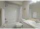 Bright bathroom with white subway tile shower/tub combination at 1701 Brigadoon Dr, Clearwater, FL 33759