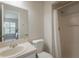 Bathroom featuring shower and a neutral color palette at 1701 Brigadoon Dr, Clearwater, FL 33759