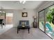 Cozy living room featuring a sliding glass doors to outdoor patio at 1701 Brigadoon Dr, Clearwater, FL 33759