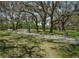 Enjoy a bike ride along the paved path in this community's popular park with mature trees at 1701 Brigadoon Dr, Clearwater, FL 33759