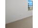 Bedroom with carpet flooring and a window at 1895 Ridgemore St, North Port, FL 34289