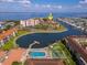 A waterfront condo community with a pool, tennis courts, boat docks and water views at 19029 Us Highway 19 N # 21E, Clearwater, FL 33764