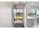 Bright and airy entryway featuring stylish tile floors and views of the beautiful waterfront at 19029 Us Highway 19 N # 21E, Clearwater, FL 33764