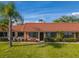 Charming one story condo with lush landscaping and well-manicured lawn at 19029 Us Highway 19 N # 21E, Clearwater, FL 33764