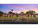Well-maintained condo building with lush landscaping and waterfront views at 19029 Us Highway 19 N # 21E, Clearwater, FL 33764