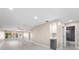Bright and airy living room with tile floors, recessed lighting, and modern finishes at 19029 Us Highway 19 N # 21E, Clearwater, FL 33764