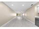 Bright living room featuring recessed lighting and new flooring, perfect for entertaining at 19029 Us Highway 19 N # 21E, Clearwater, FL 33764