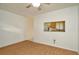 Bright living room features a pass through to the kitchen with a view outside at 2263 Fluorshire Dr, Brandon, FL 33511