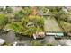 A beautiful waterfront property with mature trees, pool, and a large cleared area on a 100x184 foot lot at 2632 S Dundee St, Tampa, FL 33629