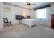 Cozy bedroom with a large window providing ample natural light at 322 Club Manor Dr, Sun City Center, FL 33573