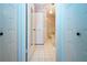 Hallway leading to a bathroom at 322 Club Manor Dr, Sun City Center, FL 33573