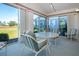 Bright sunroom with ample natural light and outdoor views at 322 Club Manor Dr, Sun City Center, FL 33573