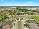 Wide aerial shot of the neighborhood near main roads, water features, and neatly arranged homes at 5324 Moon Shell Dr, Apollo Beach, FL 33572