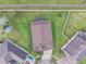 Aerial perspective of the backyard highlighting the lot's position inside the neighborhood at 5324 Moon Shell Dr, Apollo Beach, FL 33572