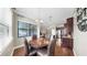Cozy breakfast nook with hardwood floors and view to the living room and kitchen at 5324 Moon Shell Dr, Apollo Beach, FL 33572