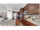 Well-equipped kitchen with stainless steel appliances and stylish backsplash at 5324 Moon Shell Dr, Apollo Beach, FL 33572