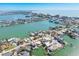 Expansive aerial showcases waterfront homes, canals, and stunning water views in coastal community at 540 59Th Ave, St Pete Beach, FL 33706
