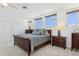 Bedroom featuring a queen bed, dresser, and windows for natural light at 540 59Th Ave, St Pete Beach, FL 33706