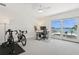 Bright bedroom featuring a large glass sliding door overlooking a waterfront view at 540 59Th Ave, St Pete Beach, FL 33706