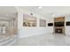 Open living room features a fireplace and a modern design at 540 59Th Ave, St Pete Beach, FL 33706