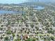 Scenic aerial view highlights the home's neighborhood, nearby lakes, and distant city skyline at 619 41St Ne Ave, St Petersburg, FL 33703