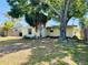 View of backyard with trees and landscaping at 619 41St Ne Ave, St Petersburg, FL 33703