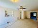 Open living area featuring a ceiling fan at 619 41St Ne Ave, St Petersburg, FL 33703