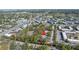 Bird's eye view of the property with lush surroundings and a glimpse of the cityscape in the distance at 7016 2Nd N St, St Petersburg, FL 33702