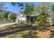 Charming single-story home featuring a well-manicured lawn and attached two-car garage at 7016 2Nd N St, St Petersburg, FL 33702