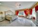 Luxury bedroom featuring a marble floor, large windows, and detailed wall coverings at 802 Druid S Rd, Clearwater, FL 33756