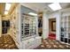 Spacious walk-in closet features custom shelving and drawers for optimal organization and storage space at 802 Druid S Rd, Clearwater, FL 33756