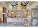 Expansive great room with marble floors, chandeliers, and scenic outdoor views at 802 Druid S Rd, Clearwater, FL 33756