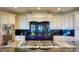 Elegant kitchen featuring custom cabinets, stainless steel appliances, and a blue stove at 802 Druid S Rd, Clearwater, FL 33756
