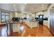 Gourmet kitchen featuring a large center island, custom cabinets, and high-end stainless steel appliances at 802 Druid S Rd, Clearwater, FL 33756