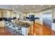 Gourmet kitchen featuring custom cabinets, a large island, and stainless steel appliances at 802 Druid S Rd, Clearwater, FL 33756