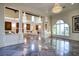 Bright living room with marble floors, large windows, and elegant architectural details at 802 Druid S Rd, Clearwater, FL 33756