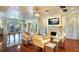 Spacious living room featuring hardwood floors, fireplace, and comfortable seating, perfect for entertaining at 802 Druid S Rd, Clearwater, FL 33756