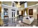 Formal living room boasts marble floors, high ceilings, and elegant finishes at 802 Druid S Rd, Clearwater, FL 33756