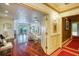 Bright and airy living room with hardwood floors, french doors, and views to the outside at 802 Druid S Rd, Clearwater, FL 33756