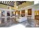 Luxury living room boasts marble floors, a fireplace, and ample seating for entertaining guests at 802 Druid S Rd, Clearwater, FL 33756